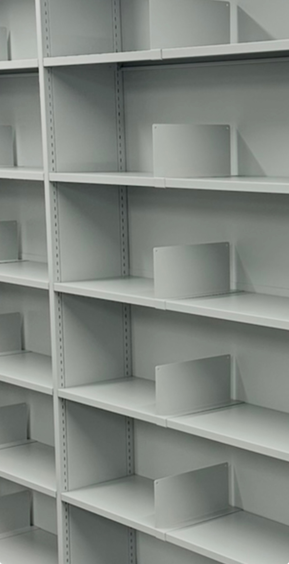 Double skin static shelving with dividers in light grey